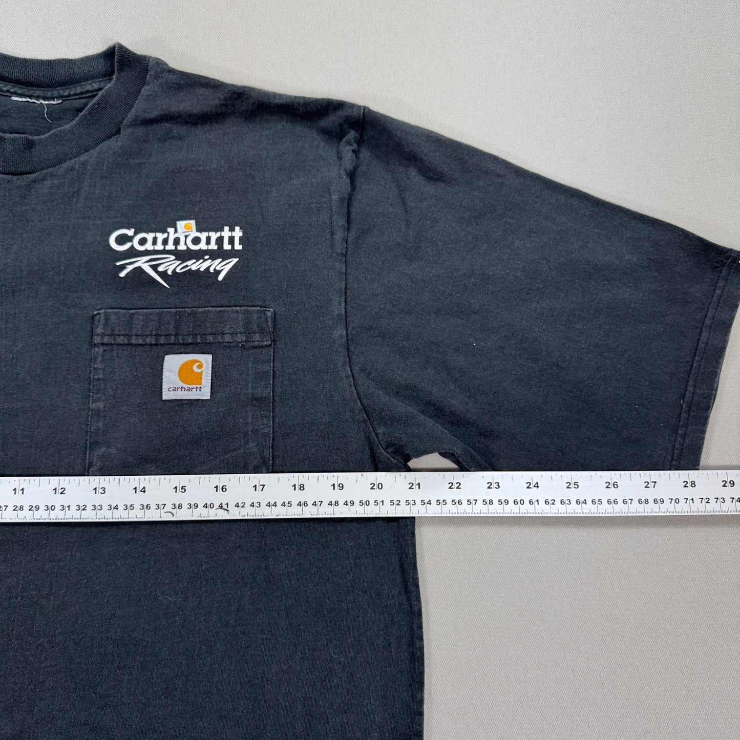 Vintage Carhartt Racing T-Shirt mens Large Faded Black Pockets Logo Crewneck