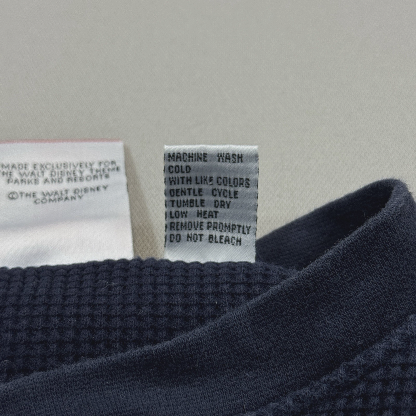 Vintage 90s Disney mens S/M Blue Polo Shirt Mickey Explorer Henley Pullover