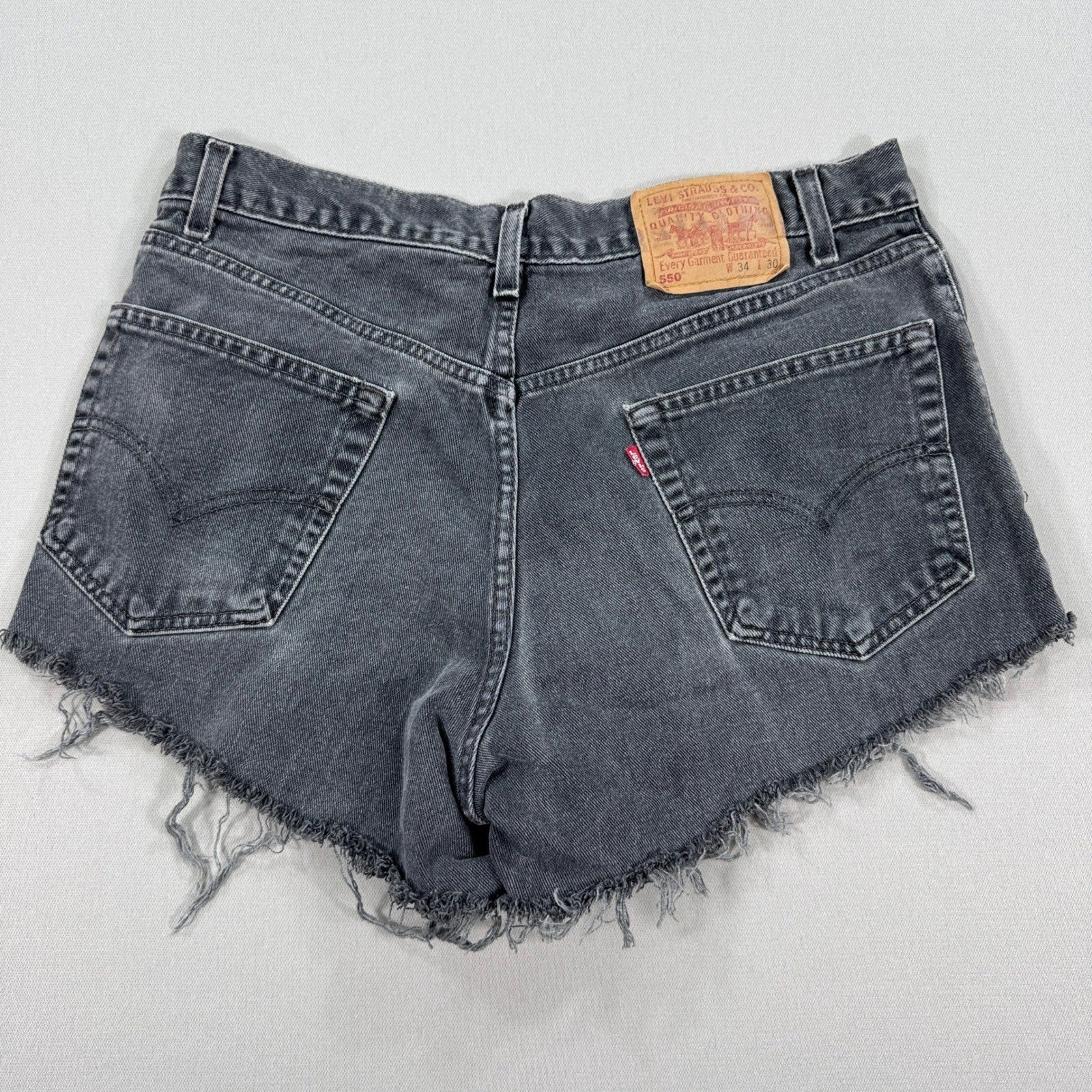 Vintage Levis Cut Off Shorts Sz 34 Fits 32 550 Distressed Faded Denim Womens