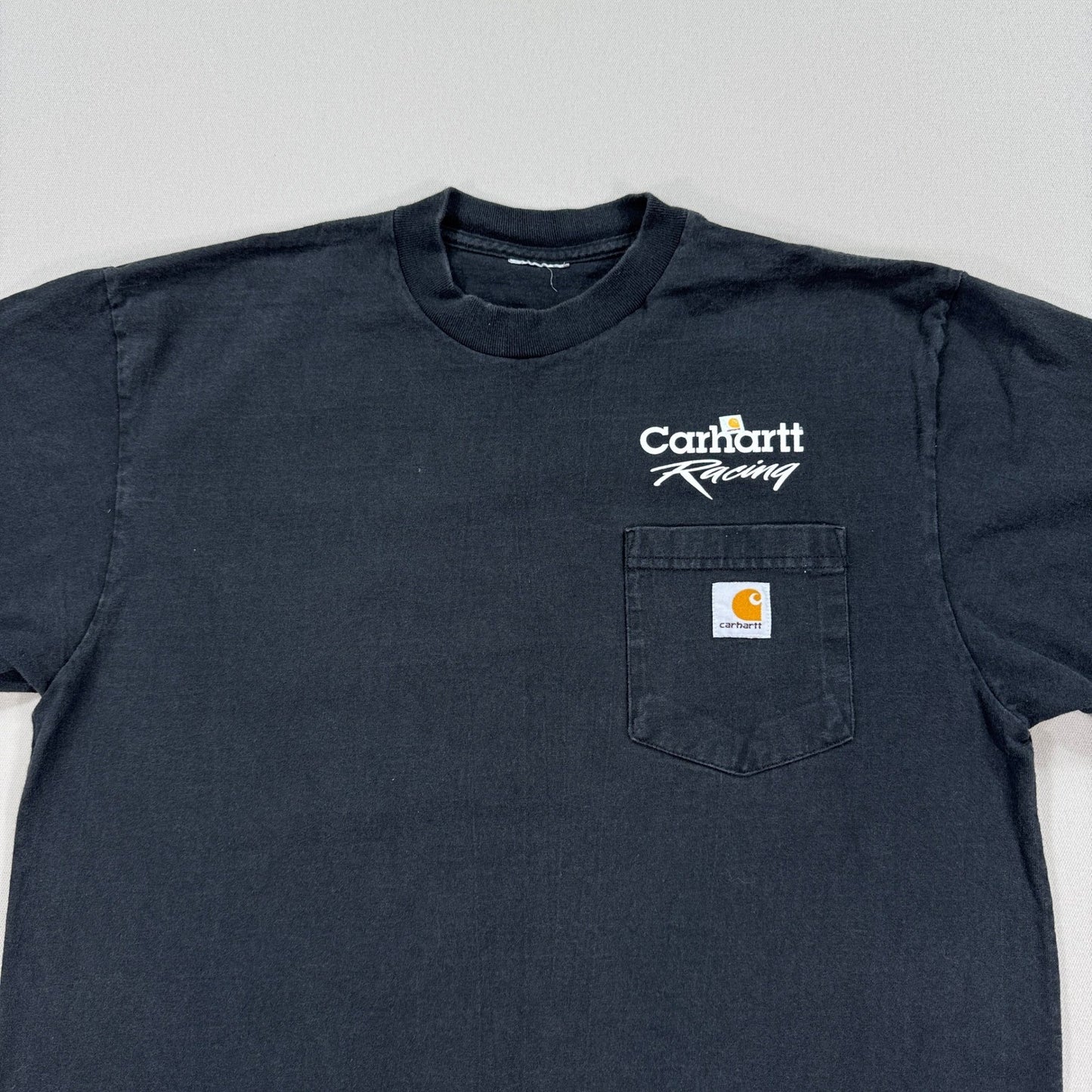 Vintage Carhartt Racing T-Shirt mens Large Faded Black Pockets Logo Crewneck