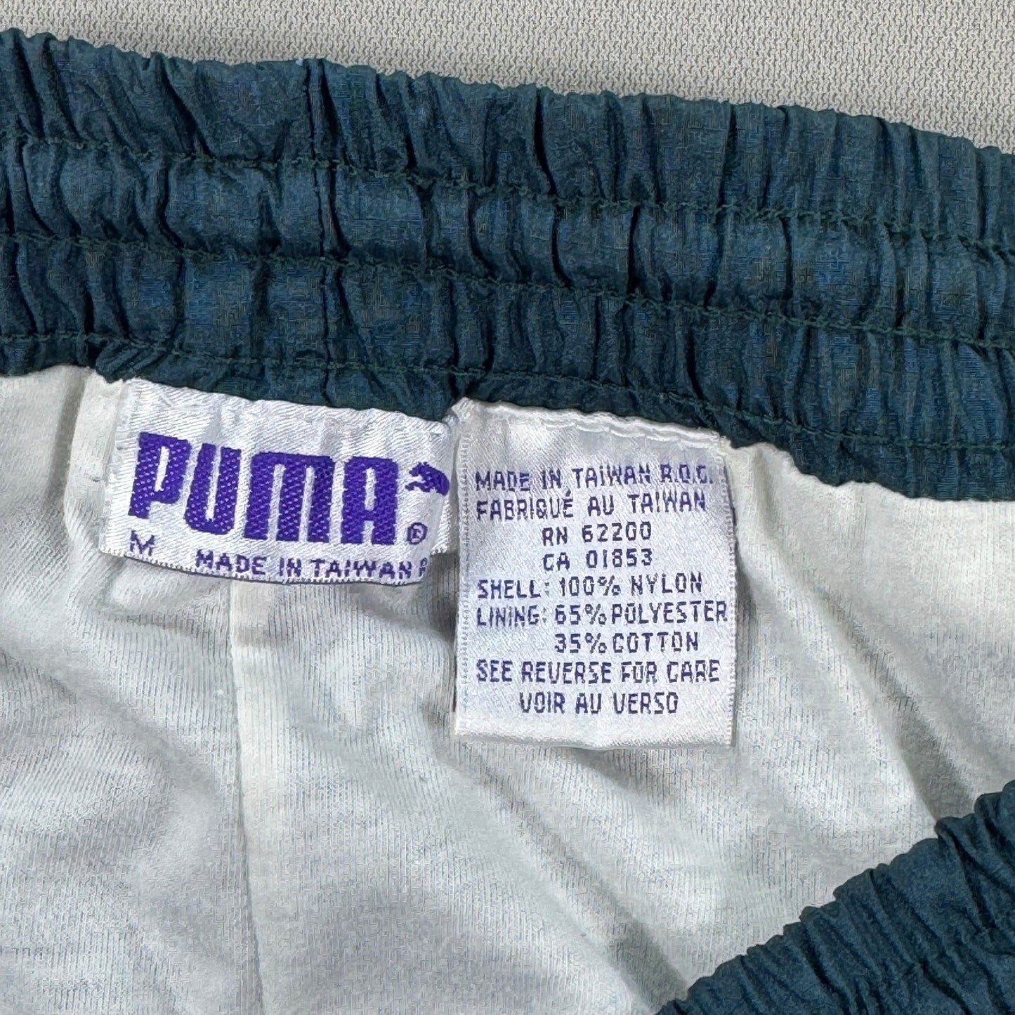 Vintage Puma Track Pants mens Medium Teal Windbreaker Nylon Zipped Ankles Y2K