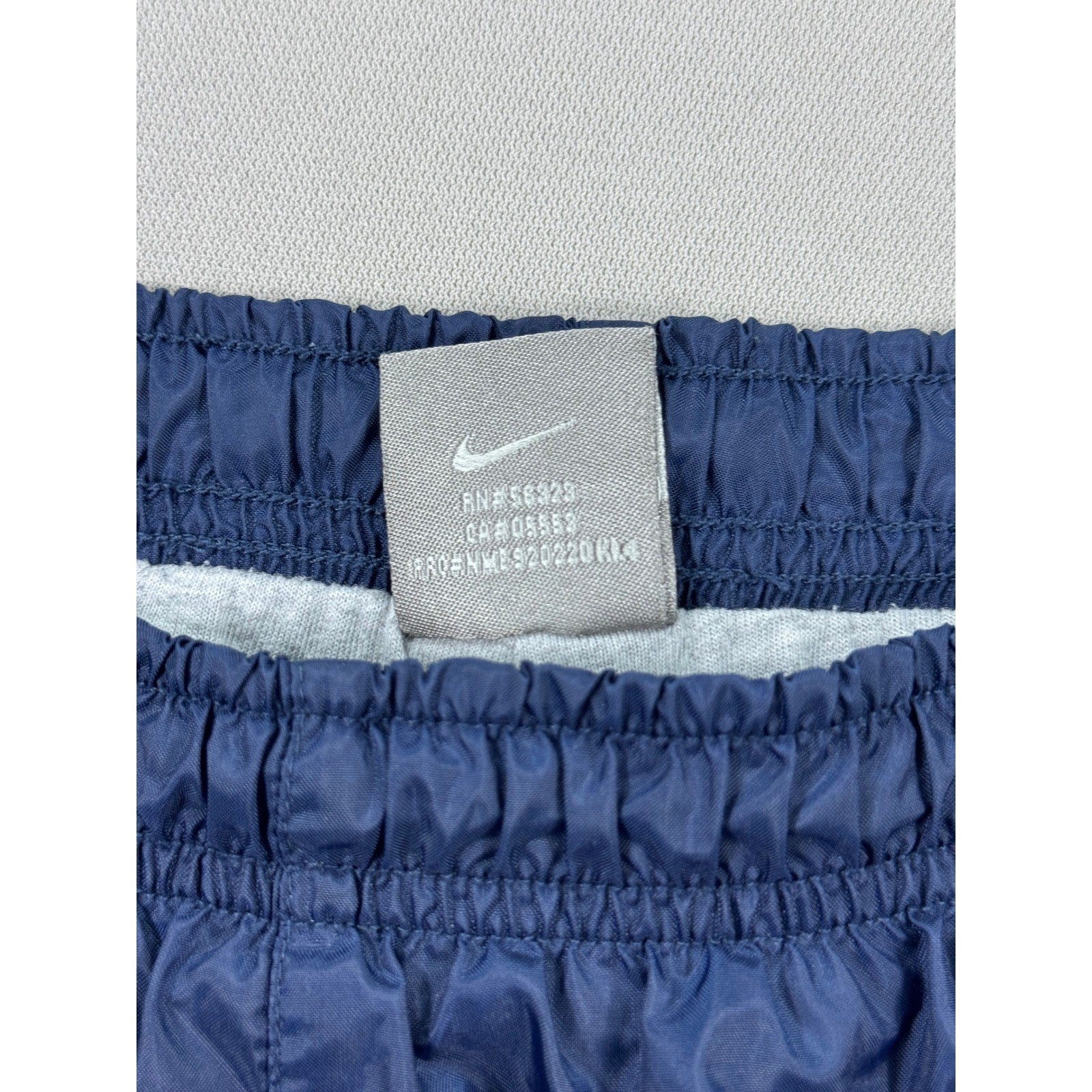 Vintage Nike Track Pants mens Large Navy Blue Windbreaker Ankle Zipped Athletic