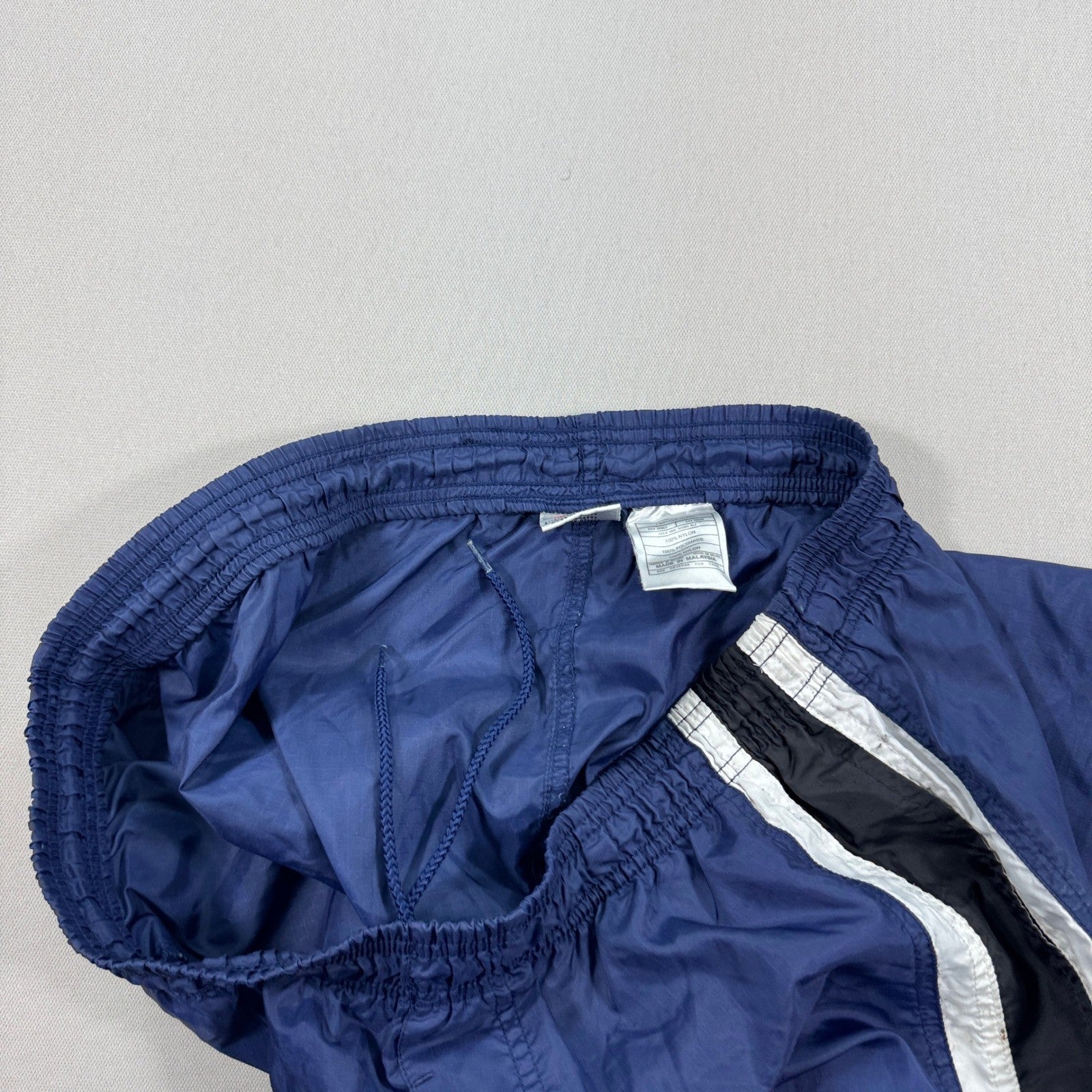 Vintage Nike Track Pants mens Large Blue Windbreaker Elastic Waist Zipped Ankle