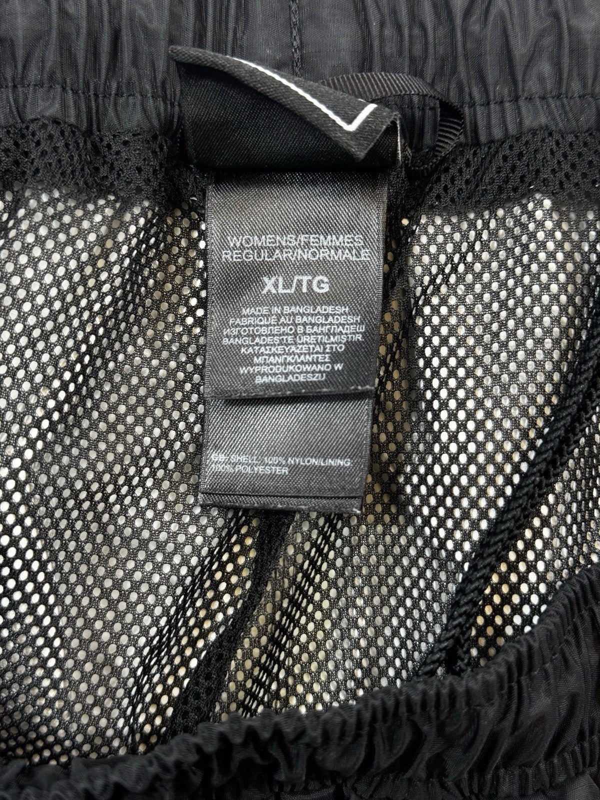 The North Face NSE Wind Track Pants Womens XL Black Trousers Loose Fit Windproof