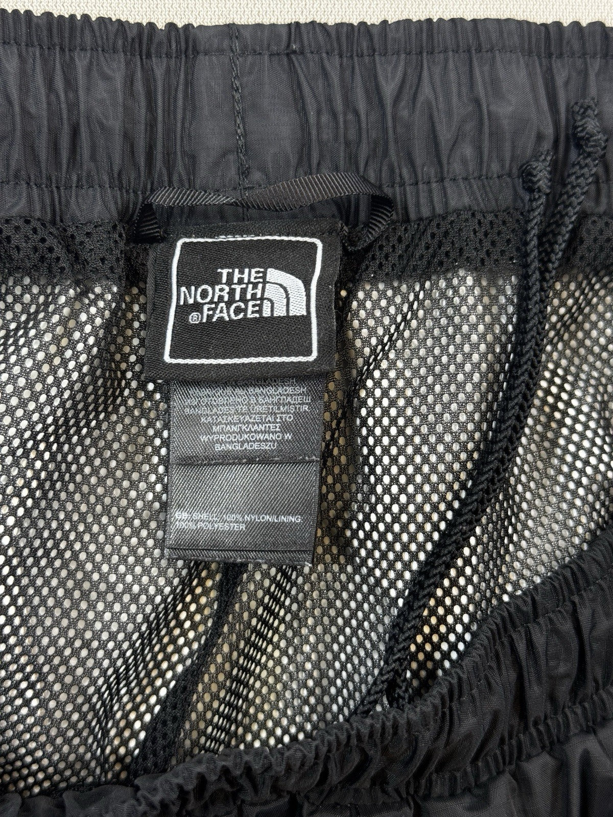 The North Face NSE Wind Track Pants Womens XL Black Trousers Loose Fit Windproof