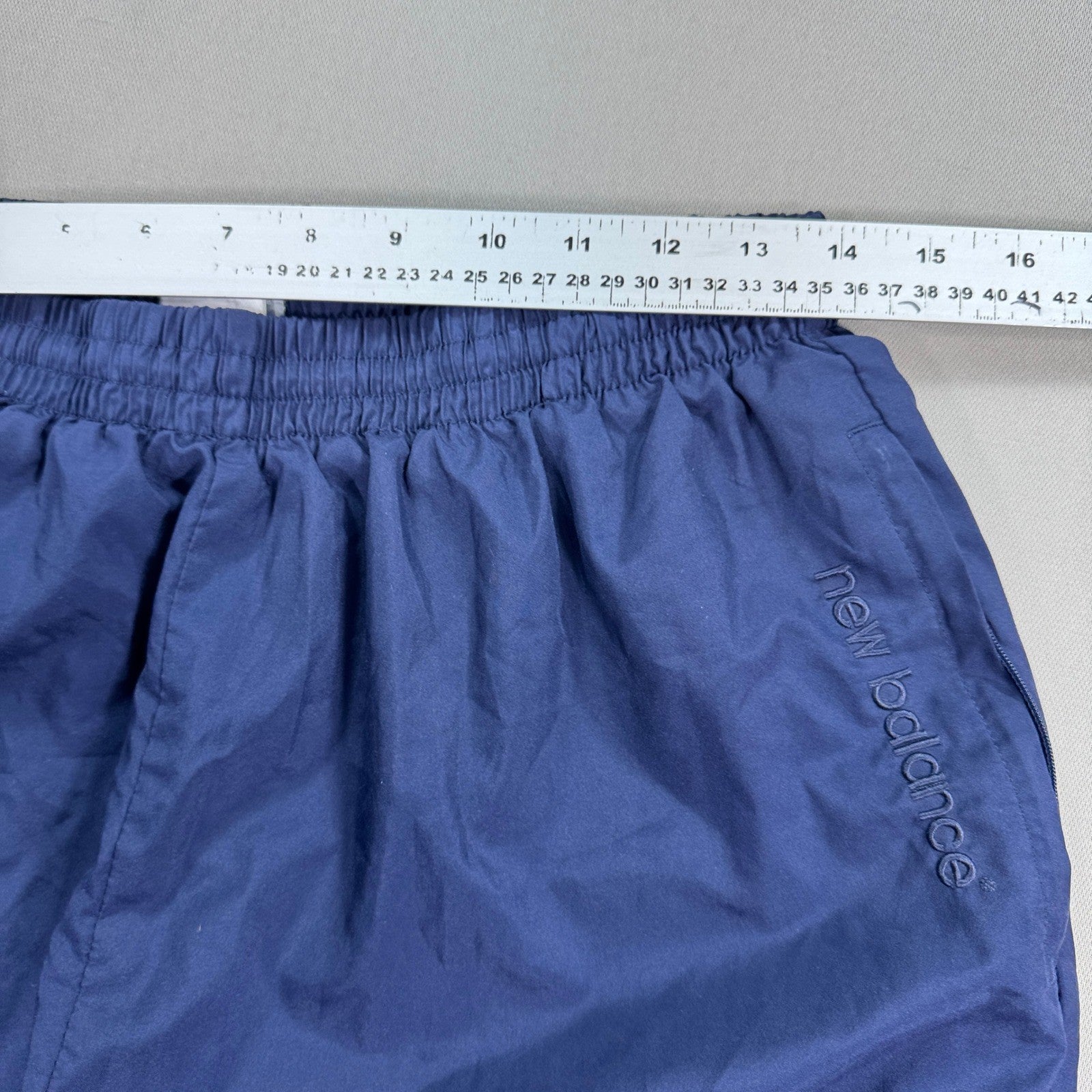 New Balance Track Pants mens XL Navy Blue Nylon Lightweight Ankle Zip Tapered